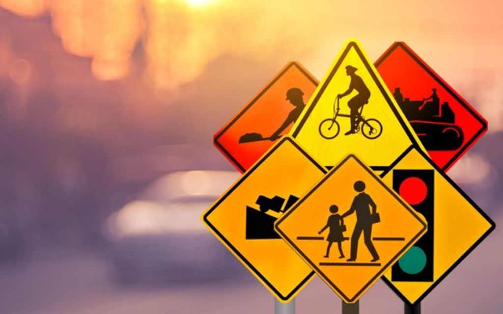 a set of warning signs to respect traffic laws
